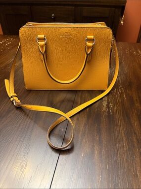 kate spade Pebbled Leather Satchel in Mustard